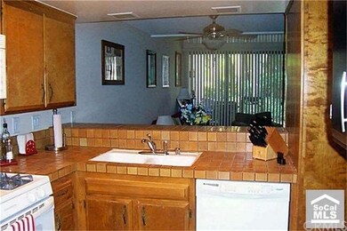 Kitchen looking into Living Room.  Wall color is N