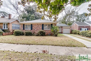 Beautiful designed brick house with a sidewalk!