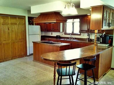 Kitchen. Enjoy 1st floor laundry and a separate si