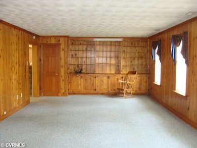 Den/Family/Great Room - The den/ great room measures 32 ft and with fireplace.