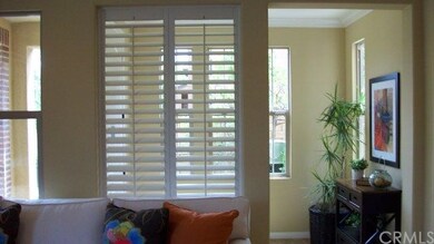 Entry foyer welcomes friends and family, bright an