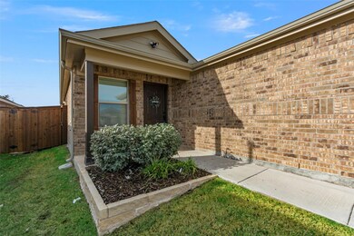 Doorway to property with a yard