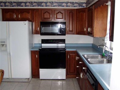 Kitchen. View of L-shaped kitchen.