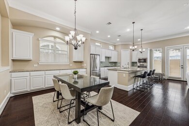 This photo showcases a spacious, open-concept kitc