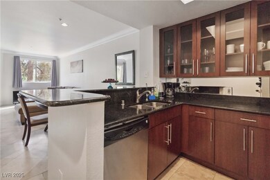 Bar featuring dishwasher, a sink, ornamental moldi