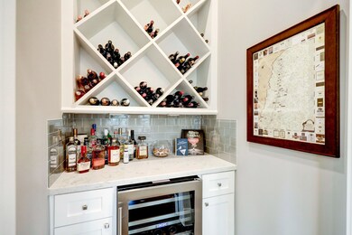 The fabulous bar area opens up from the dining are