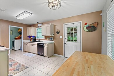 Kitchen, breakfast area and laundry room