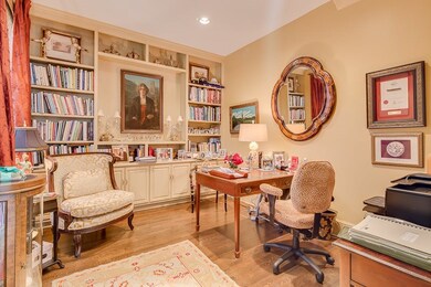 This room is just off the entry with hardwood floo