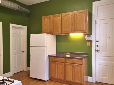 A clean and simple kitchen with ample storage is a