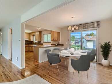 Dining room opens to kitchen and steps out to pati