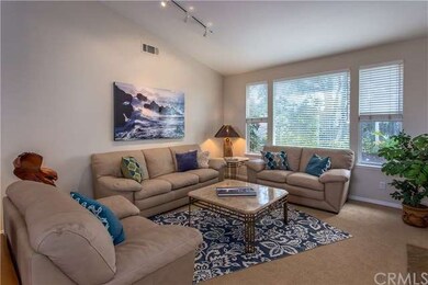 The living room is very large, easily accommodatin