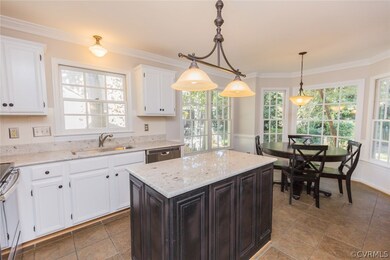 Updated kitchen includes granite, SS appliances, n