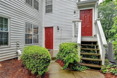 Doorway to property with central AC