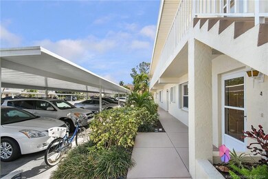 Condo Exterior Entry and Covered Parking Area