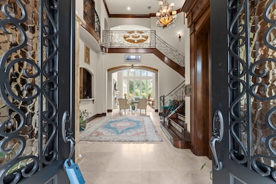 This gorgeous home greets you with soaring ceiling