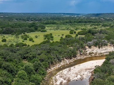 Aerial view of property's location featuring a fo