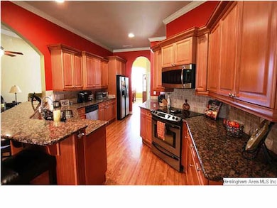 Granite,Tile,Custom Cabinets, and plenty of space 