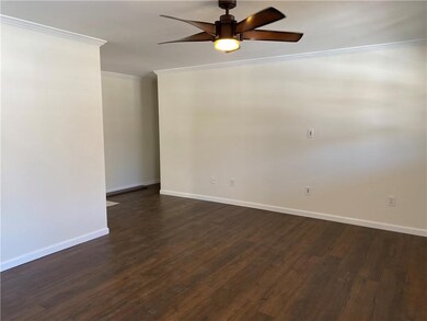 Living Room has new laminate wood flooring, crown