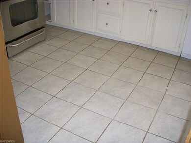 Ceramic tile completes the kitchen.