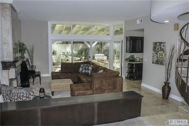 This comfortable living room is one where you can 