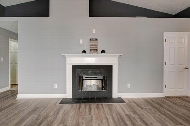 Fireplace is wood burning or use the electric insert. 