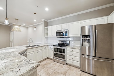 The kitchen features top-of-the-line Samsung appli