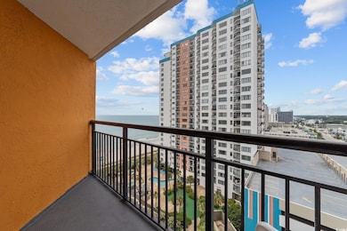 Balcony featuring a view of city