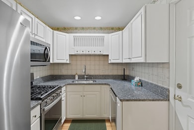 Beautiful granite counter tops and stainless steel appliances