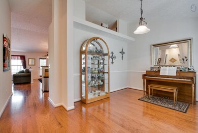 Formal dining room with hardwoods throughout main living area