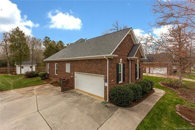 Side load garage with ample parking
