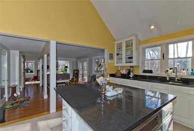 Kitchen open to dining area and...