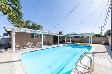 Sparkling pool and alumawood patio covers