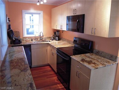 Kitchen. Custom Cabinets and granite tops. Tub sin