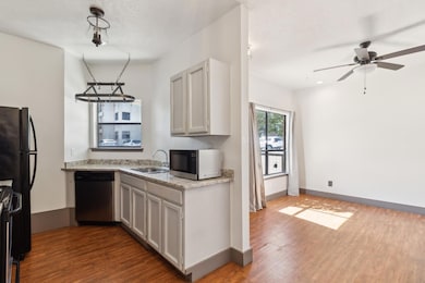Kitchen featuring stainless steel appliances, a s
