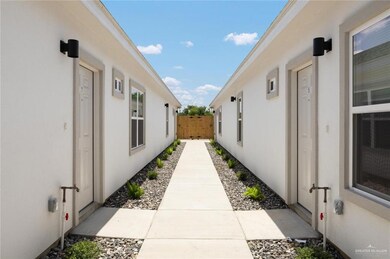 View of side of home featuring stucco siding
