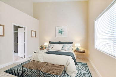 Bedroom featuring light tile patterned flooring, m