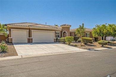 Mediterranean / spanish home with driveway, stucco