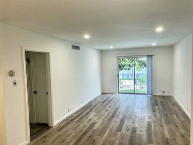 From the entry hall looking toward the glass doors