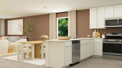 Kitchen featuring stainless steel appliances, ligh
