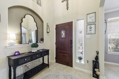 Welcome your guests in this light and open entry.