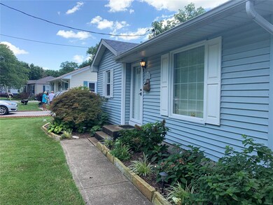 Welcome home! Beautiful landscaping & great curb a