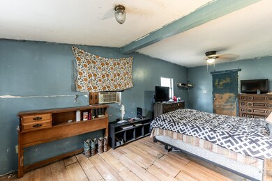 The master bedroom offers a retreat from the hustl