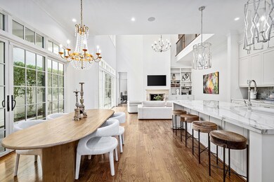 Dining area with beautiful crystal chandelier, ope