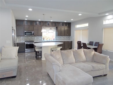 Living room featuring recessed lighting and light