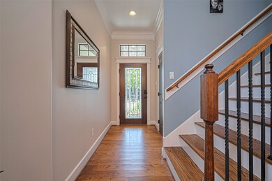Entry featuring wood flooring