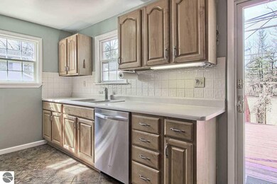 Galley kitchen with plenty of cabinet space, plus 
