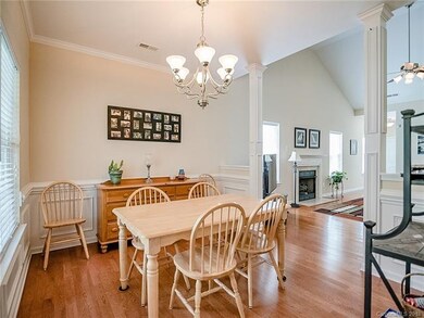 Dining area open to great room and kitchen