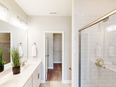 This is a photo of one of our model homes. Please know that some of the exterior and interior finishes, paint, and amenities may vary.