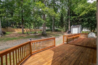 View from the back deck to the back yard, fire-pit