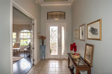 Beautiful glass entry makes for a welcoming entran